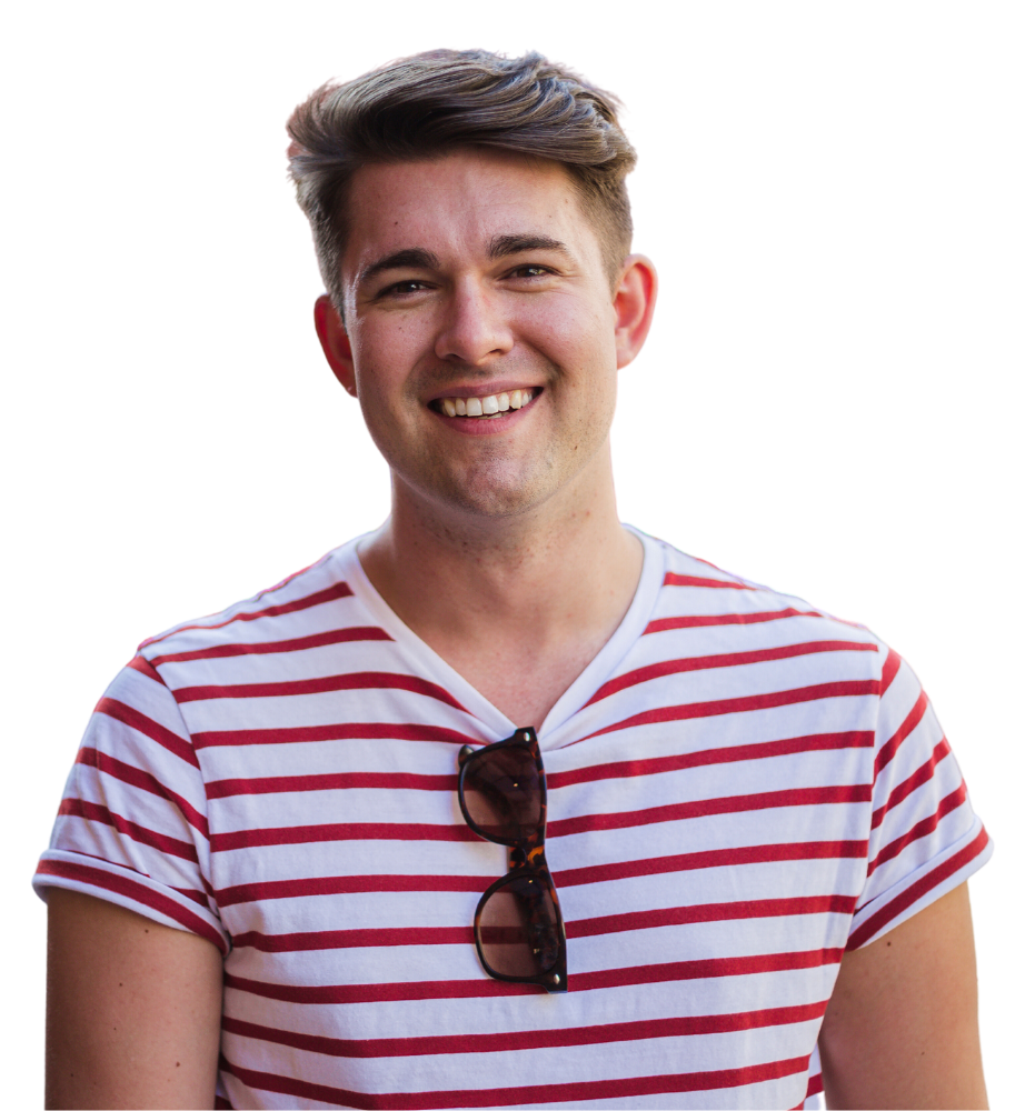 A young man smiling in a stripy red and white t-shirt and sunglasses